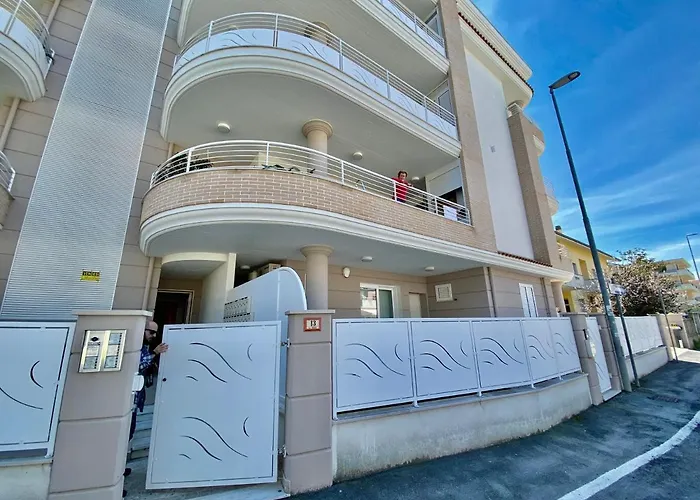 Апартаменты Al Mare Con Giardino, E Piscina