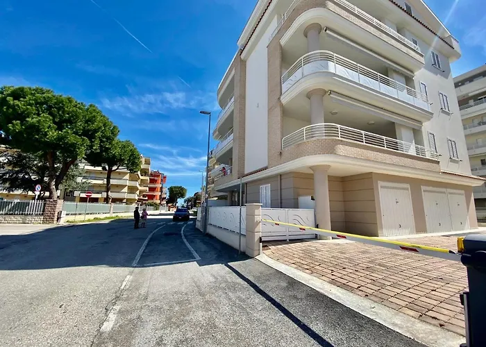 Апартаменты Al Mare Con Giardino, E Piscina